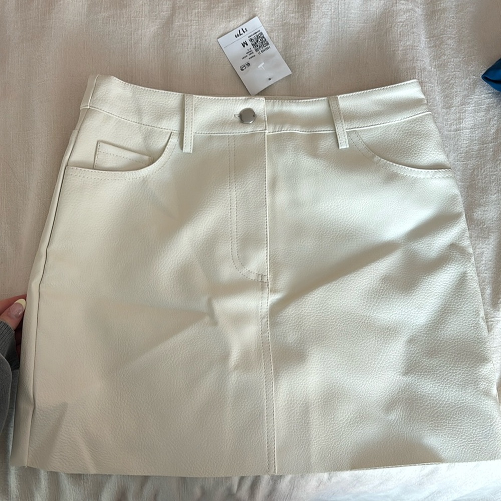 White pleather mini skirt
